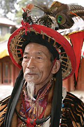 Old Dongba man in traditional costume, Lijiang