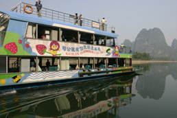 River boat and limestone karsts on the Li River, south of Guilin