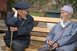 Old men in Lijiang town centre