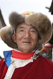 Tibetan in traditional costume, Old Lijiang