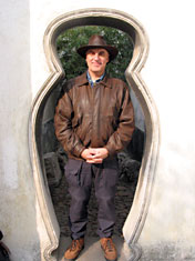 Peter and hat in snug-fitting doorway, Tuisi Garden, Tongli