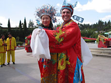 Peter and bride in ceremonial Chinese wedding outifts