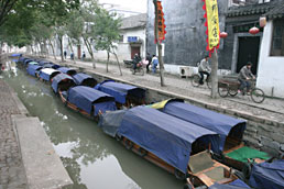 Canal boats at dawn in Tongli