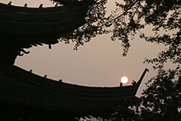 Tianning Temple roof and setting sun